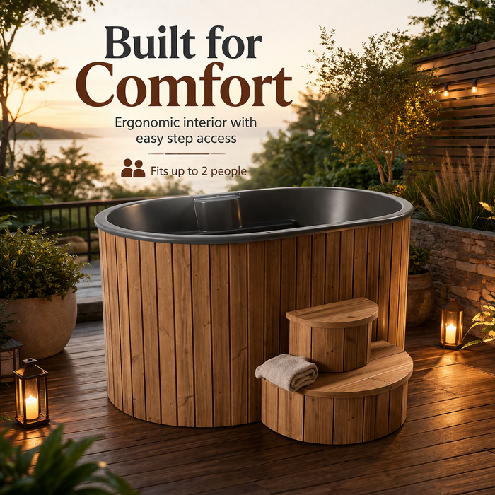 Wooden hot tub with steps on a wooden deck with scenic background. Built for Comfort